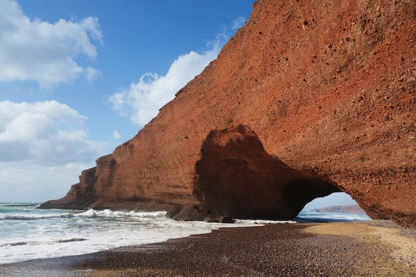 Legzira Arch Beach — iconic red sandstone arches near Mirleft